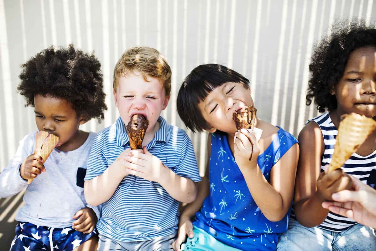 a group of kids eating ice cream
