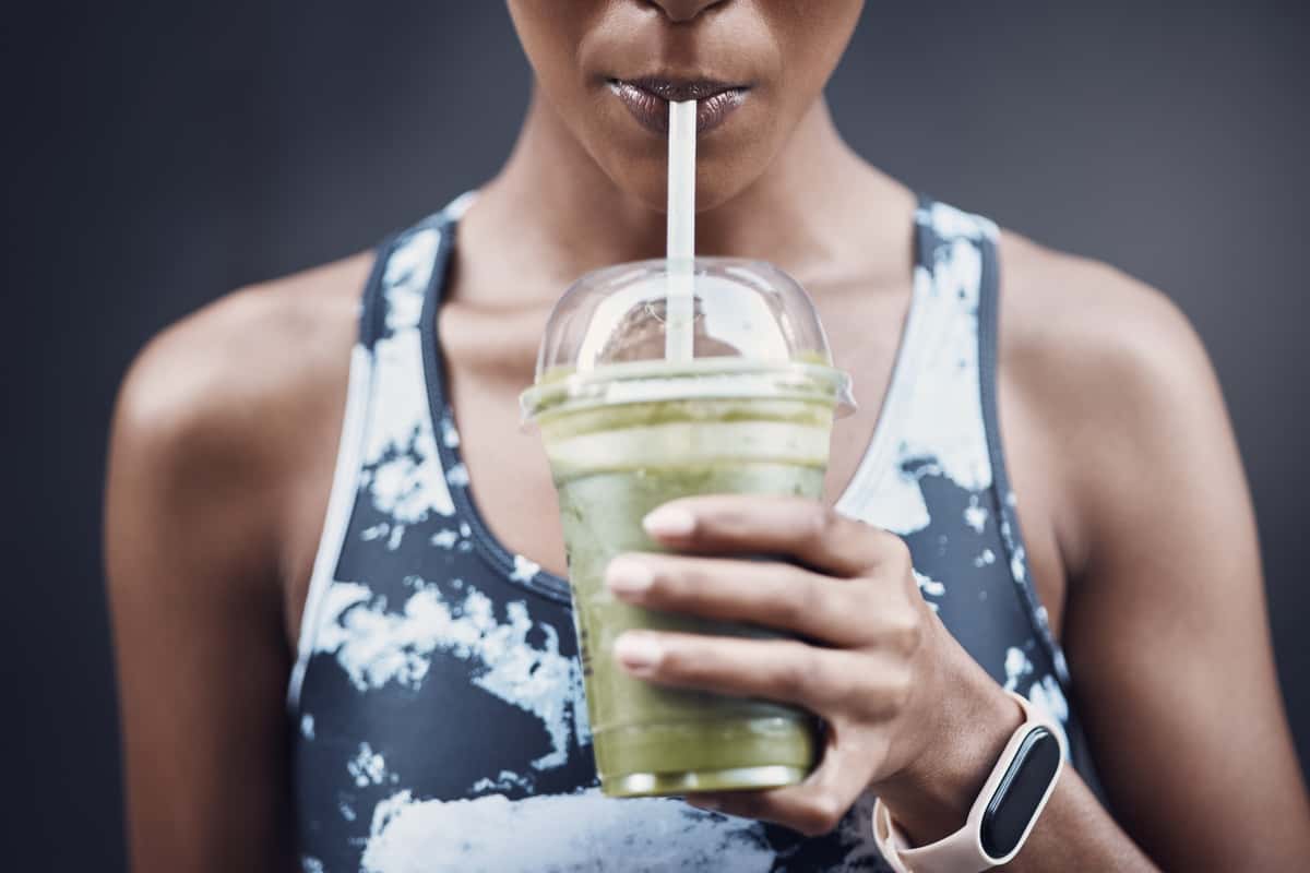 woman drinking a healthy drink