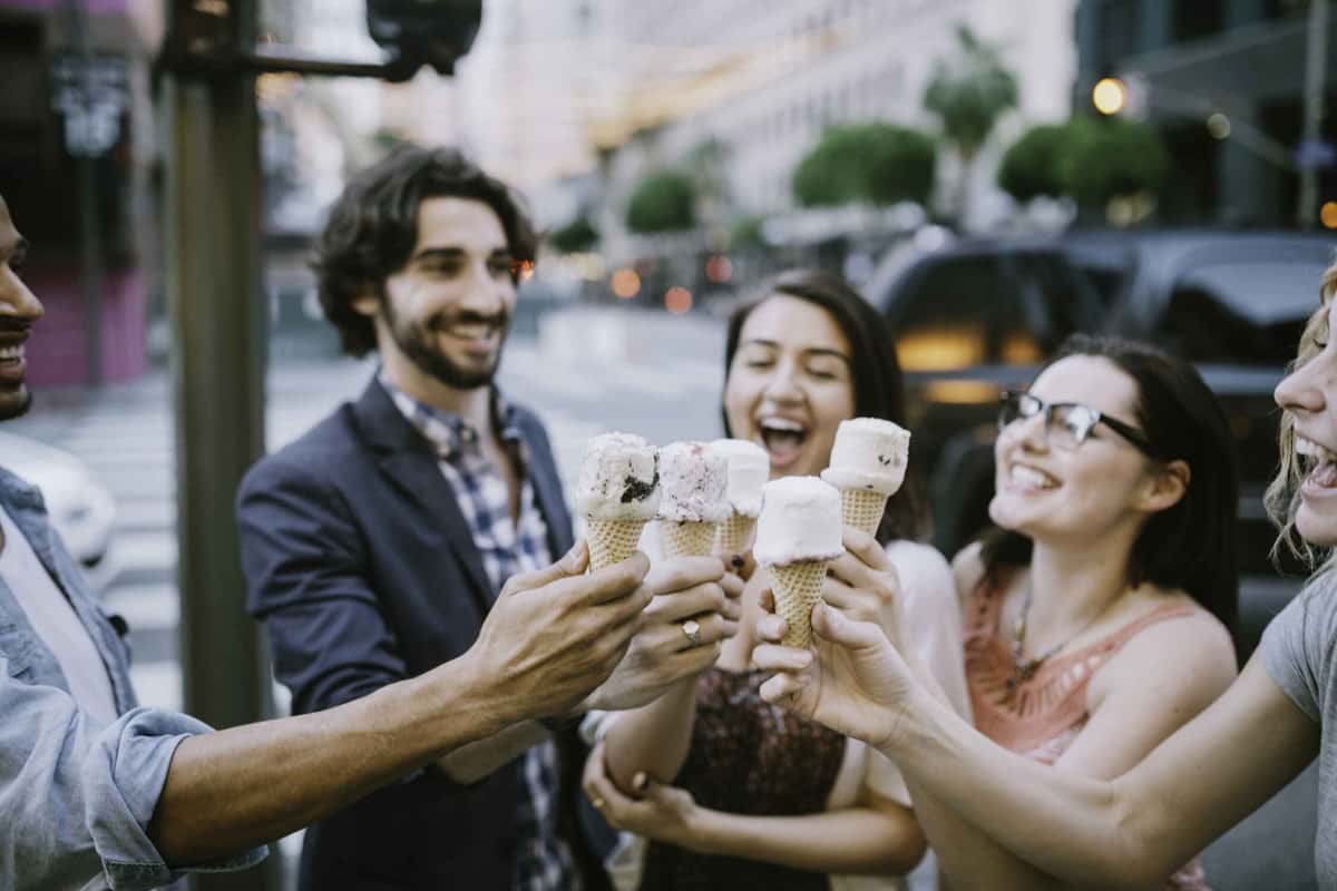 group of people each holding an ice cream