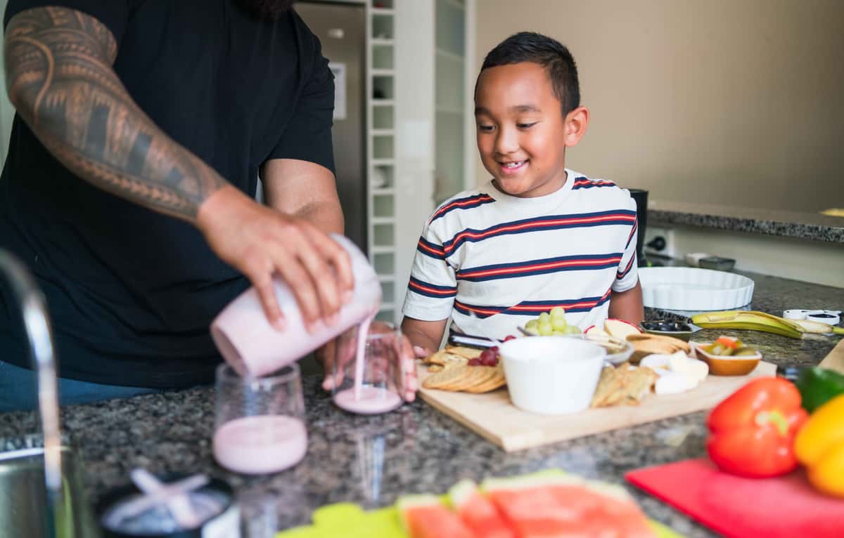a kid eating healthy dessert