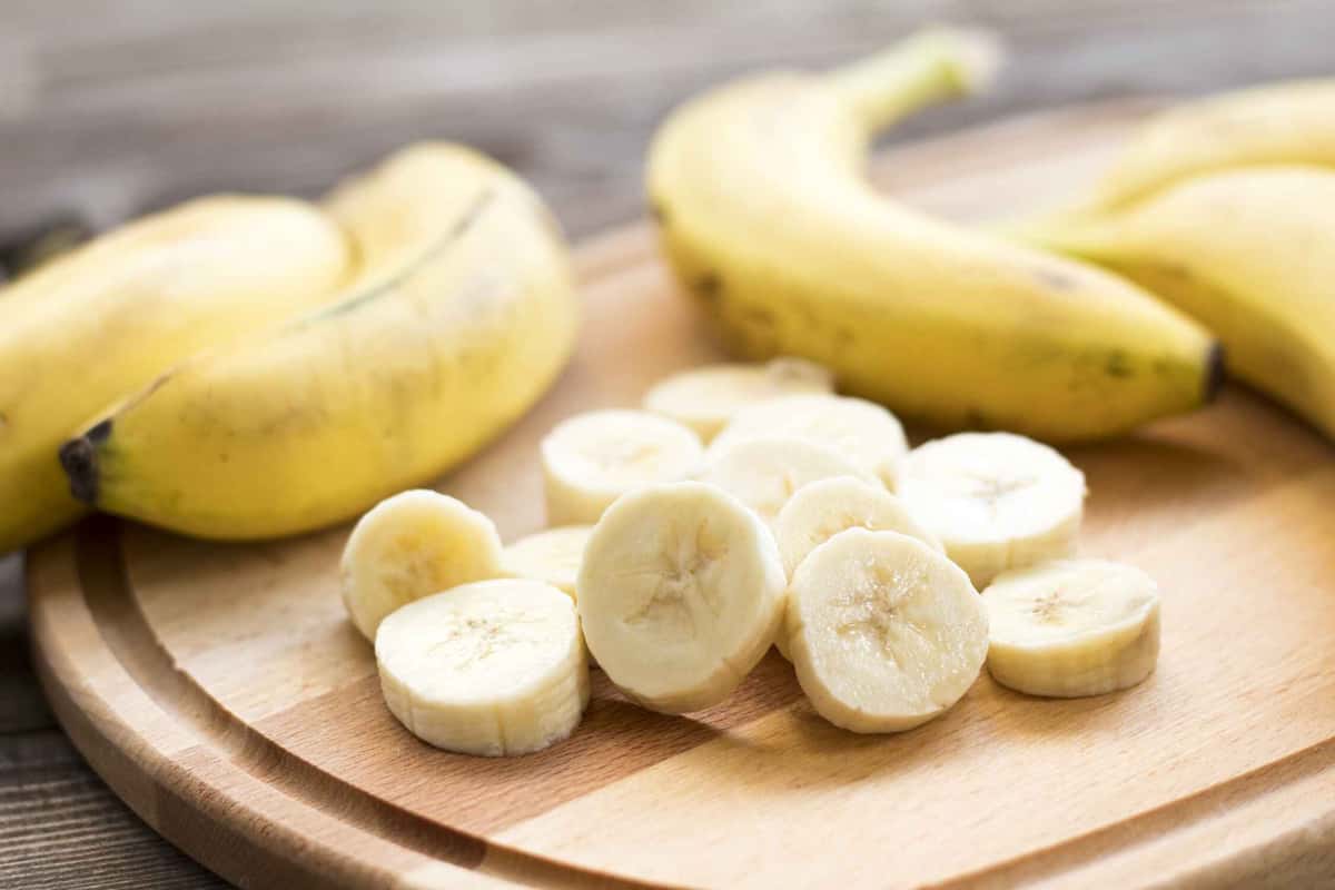 sliced bananas on a chopping board