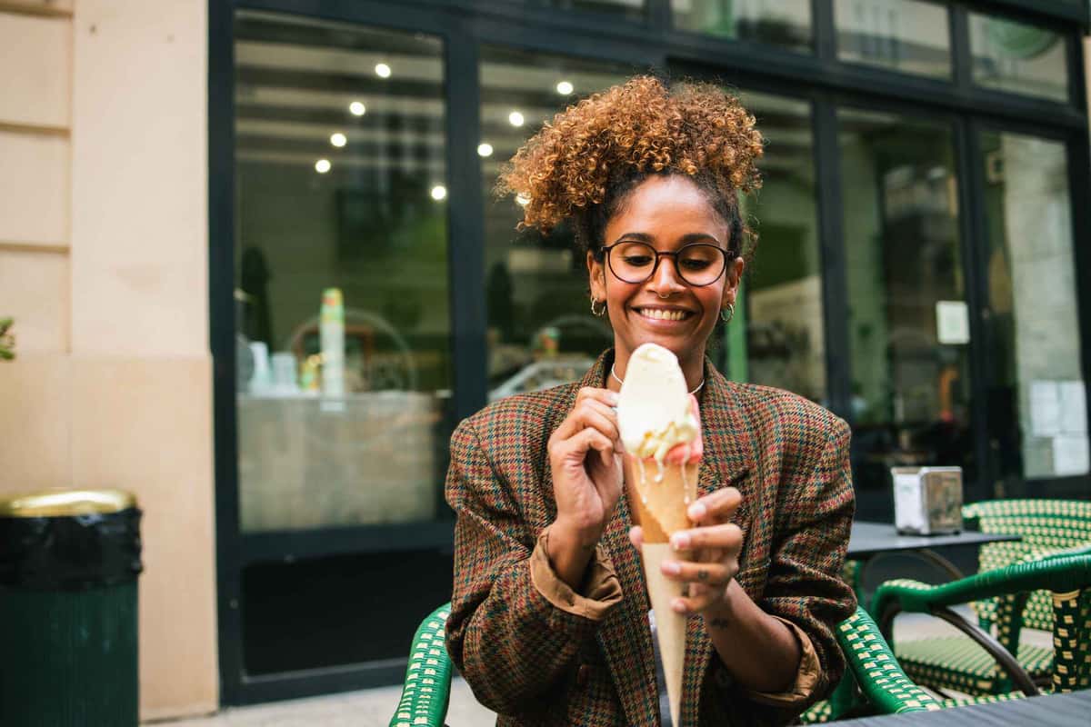 woman holding an ice cream