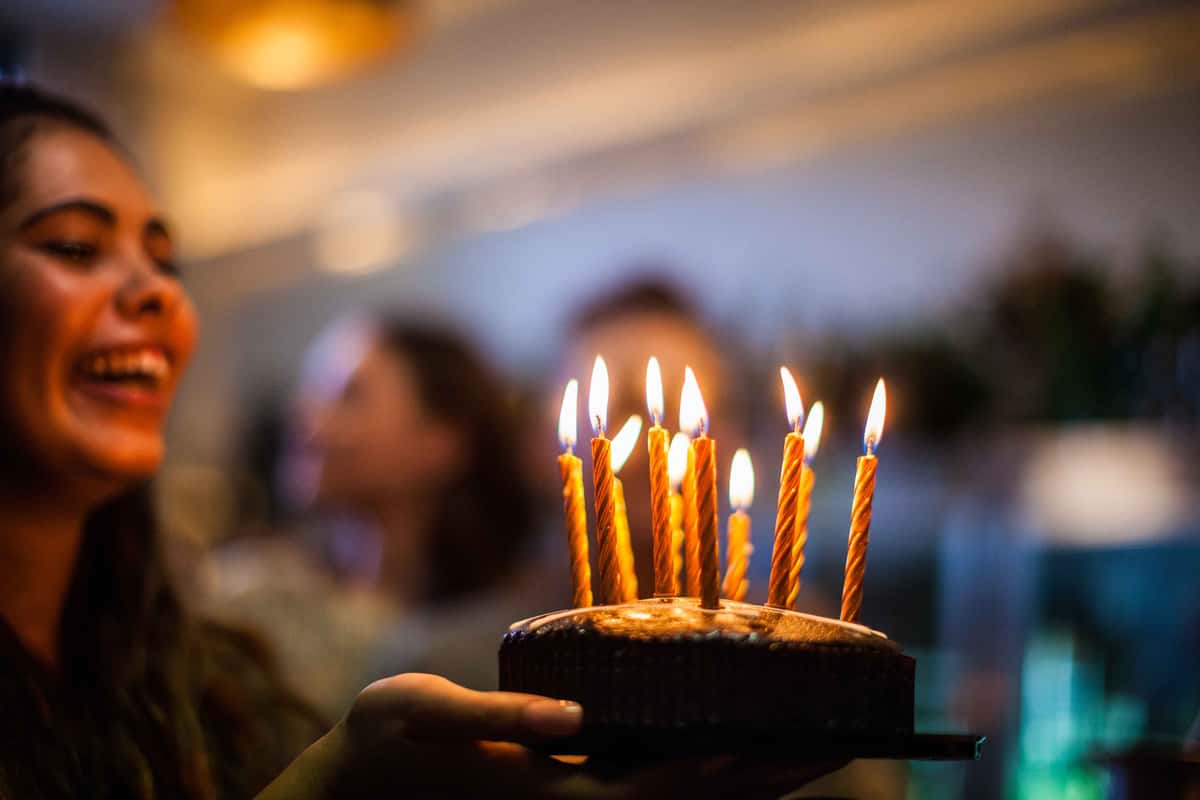 birthday cake with lit candles