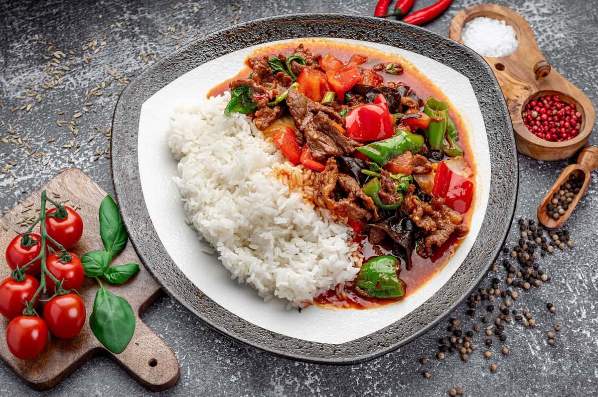 Uzbek plov rice dish with tender beef and vegetables