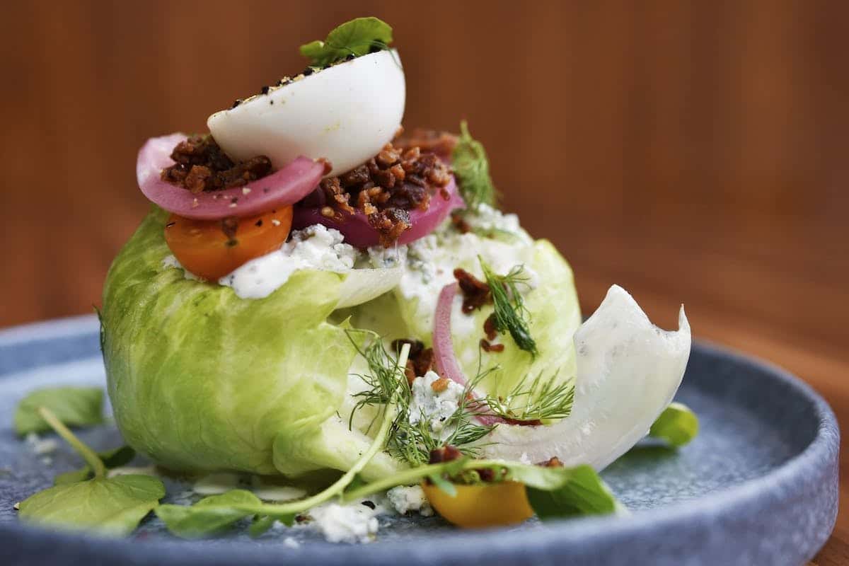 wedge salad with boiled egg and bacon