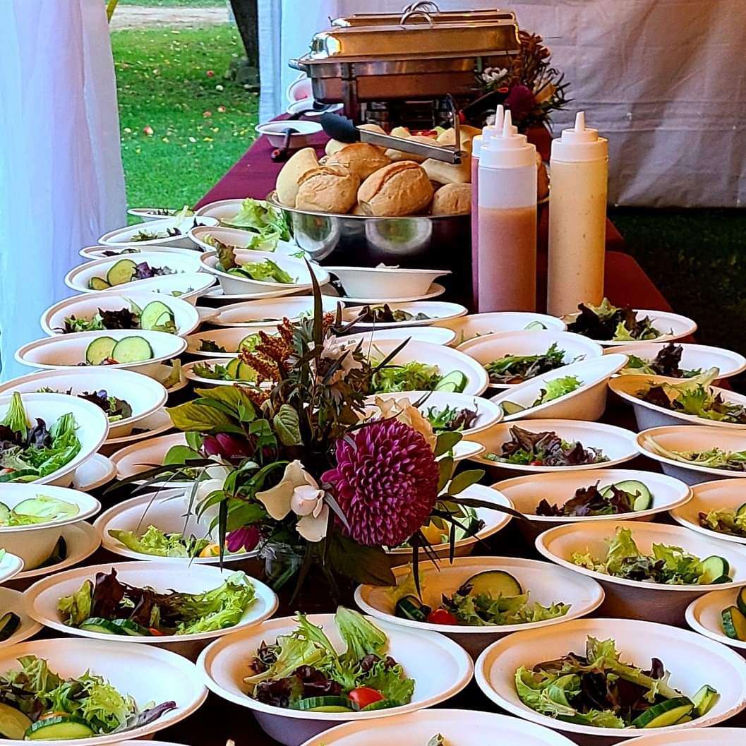 Display for catering. A table with individual salads.