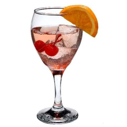glass with a drink, cherries and an orange slice