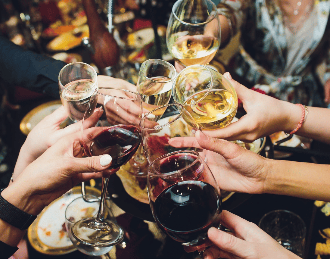 people toasting with wine