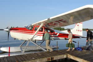 men getting on a light air craft