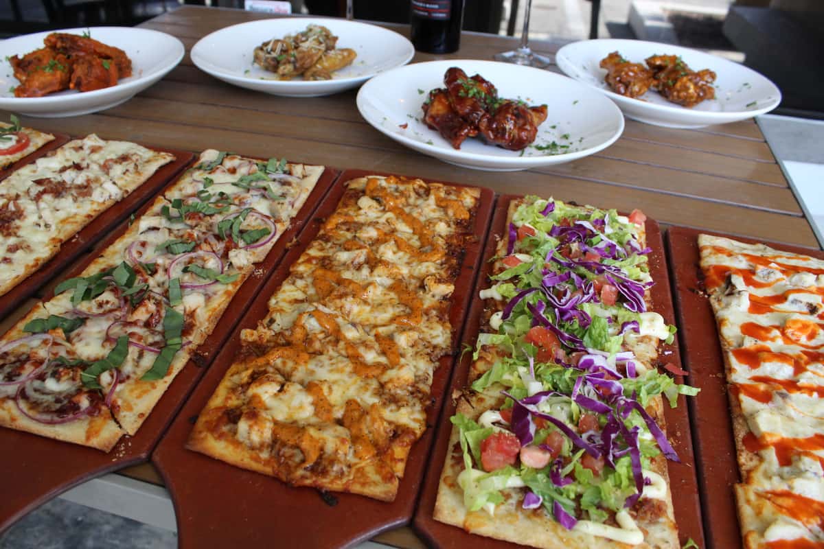 flatbreads on display with wings