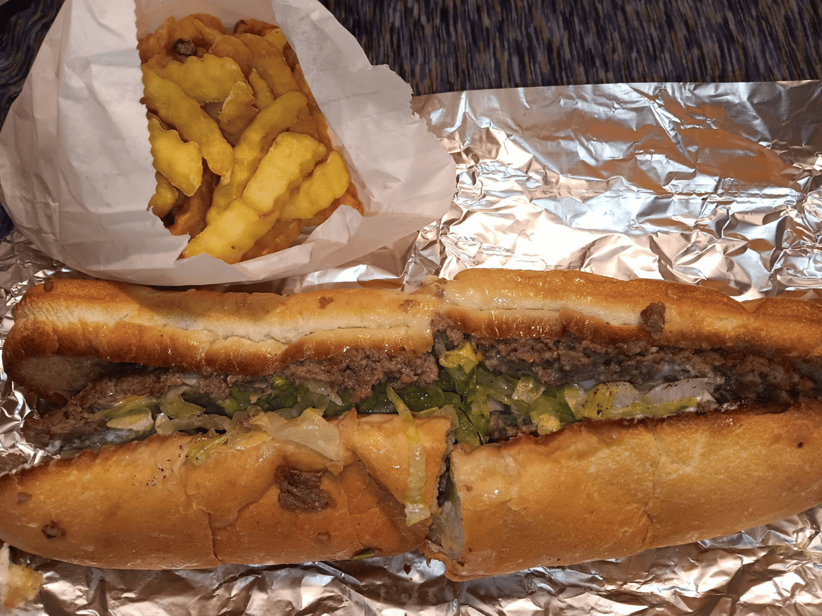 Cheese Steak sandwich with fries
