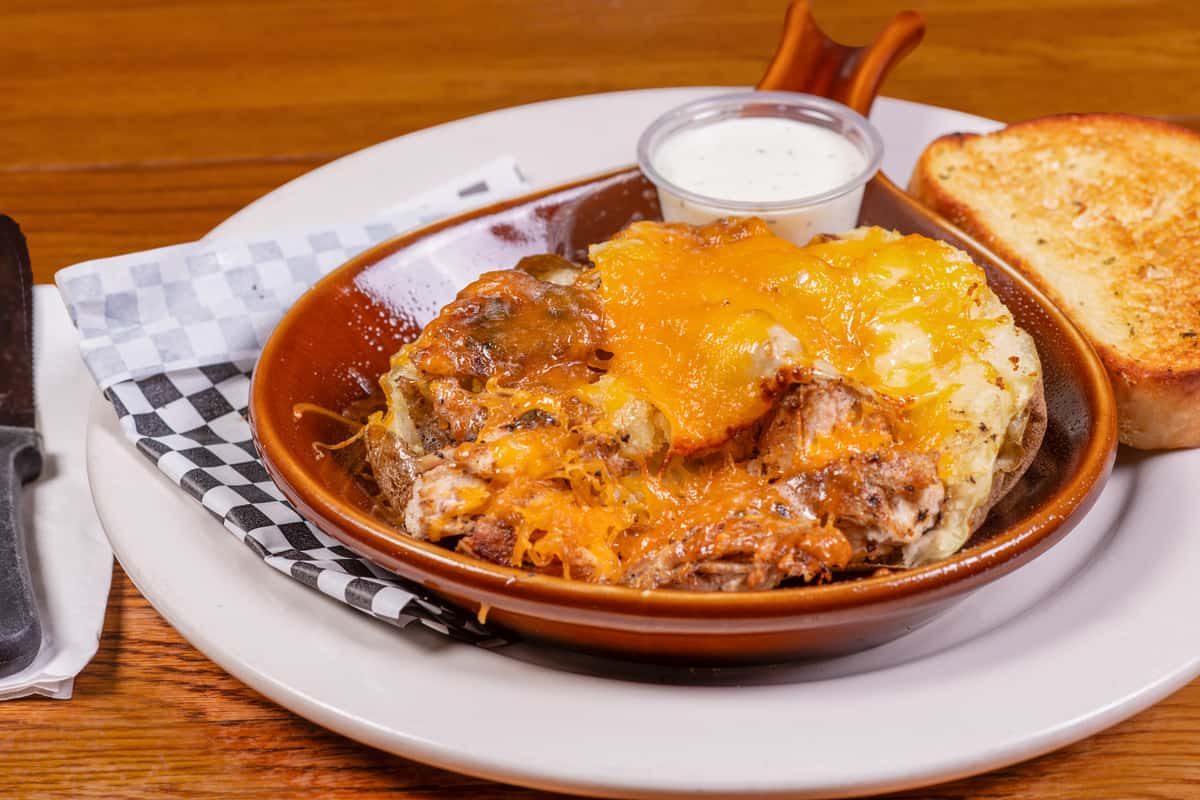 Loaded chicken tater with melted cheese and bacon at Jake & Rip's in Grenada, Mississippi.