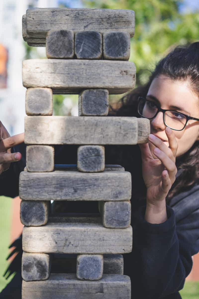 woman playing jenga