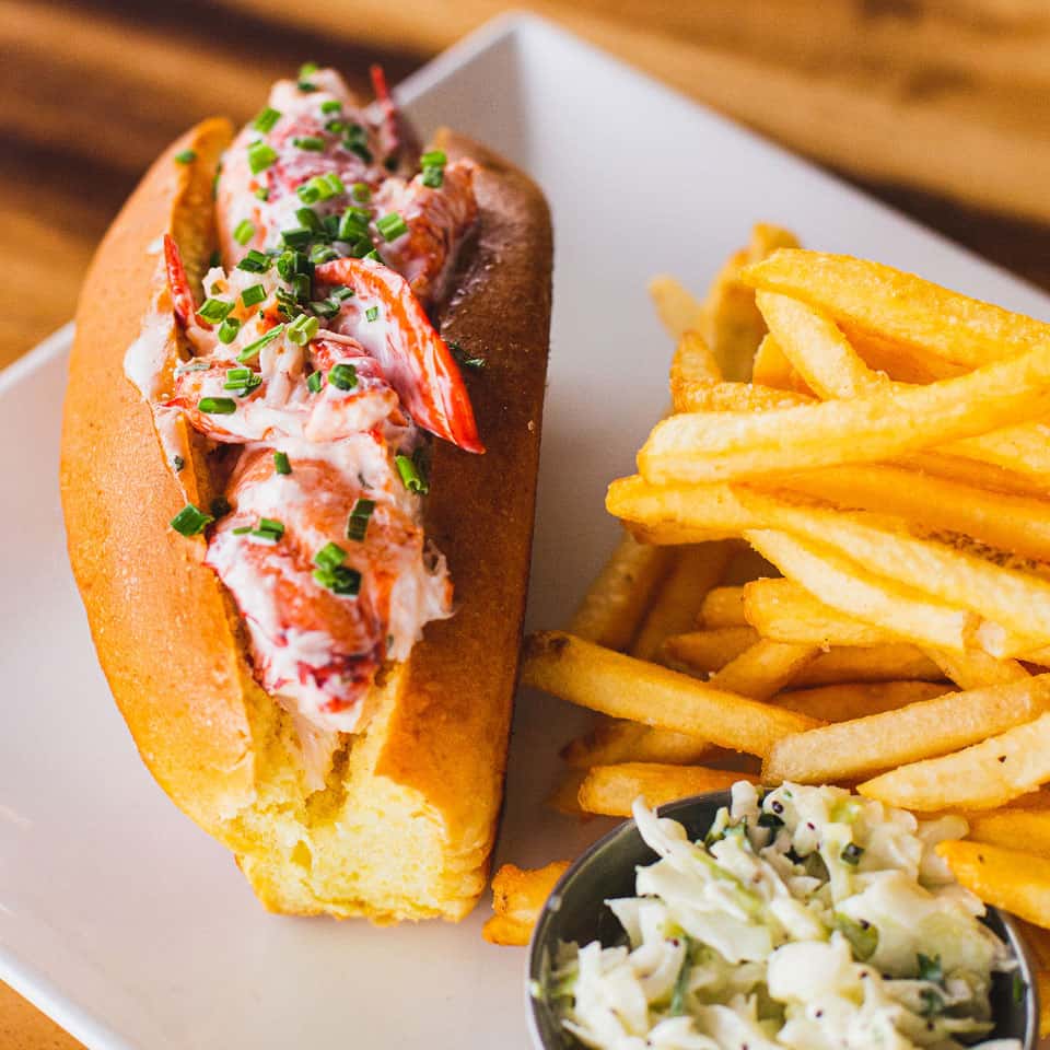 Fresh Shrimp Po'Boy with fries and slaw