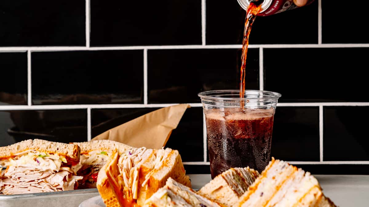Drink pour and sandwich