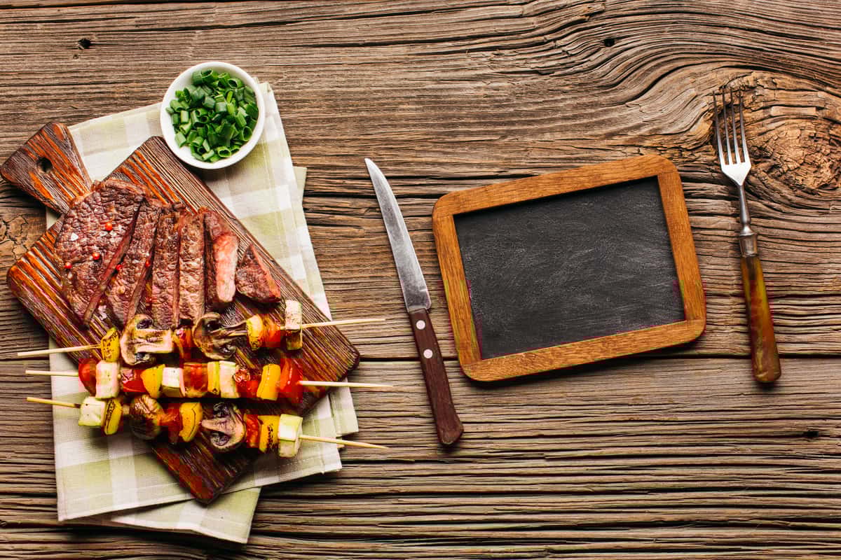 grilled steak meat skewer with blank slate
