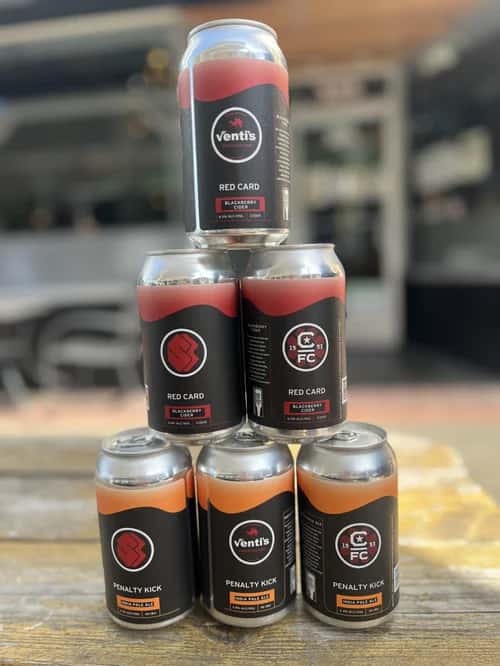 beer cans stacked like a pyramid