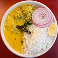 Customizable Indian rice bowl with bold spices and fresh ingredients at Lazeez by Dhaba Parsippany NJ