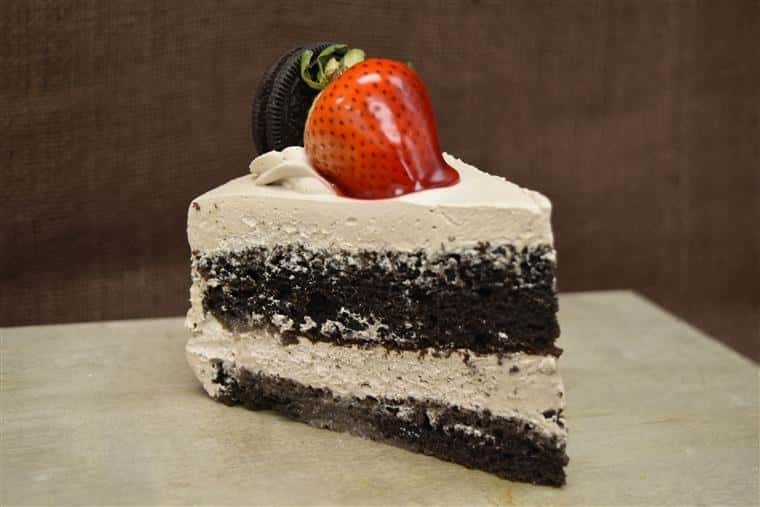 chocolate mousse cake slice with a strawberry on top