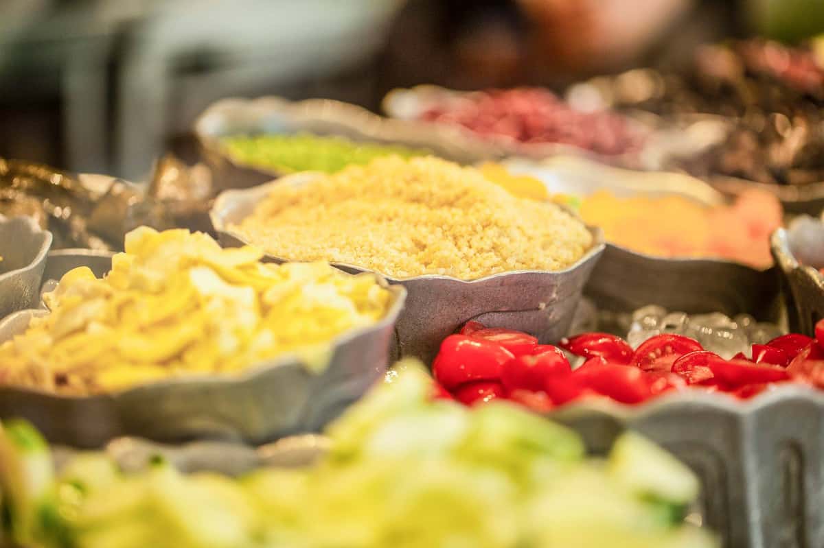 Salad bar filled with an assortment of vegetables