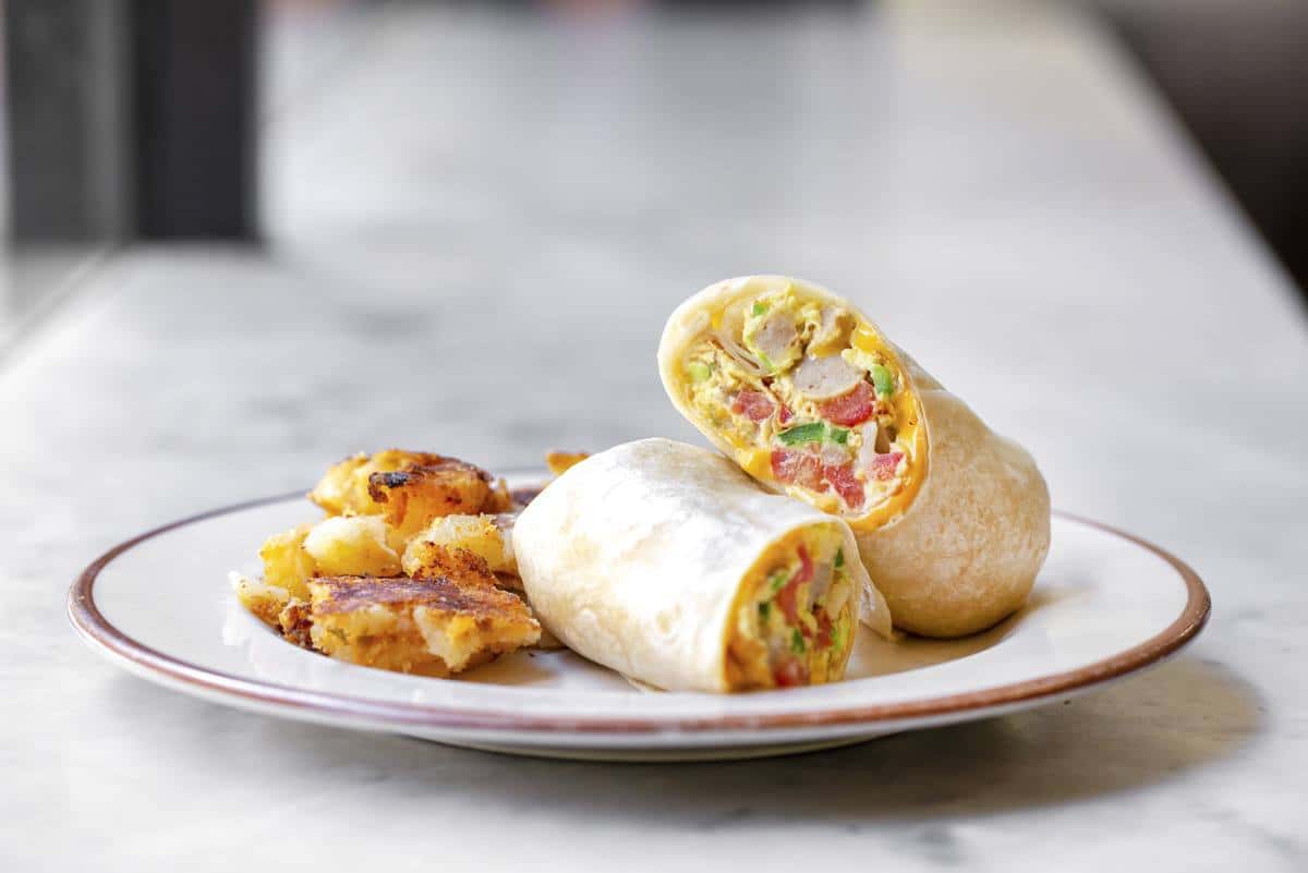 Egg and ham wrap with side of home fries