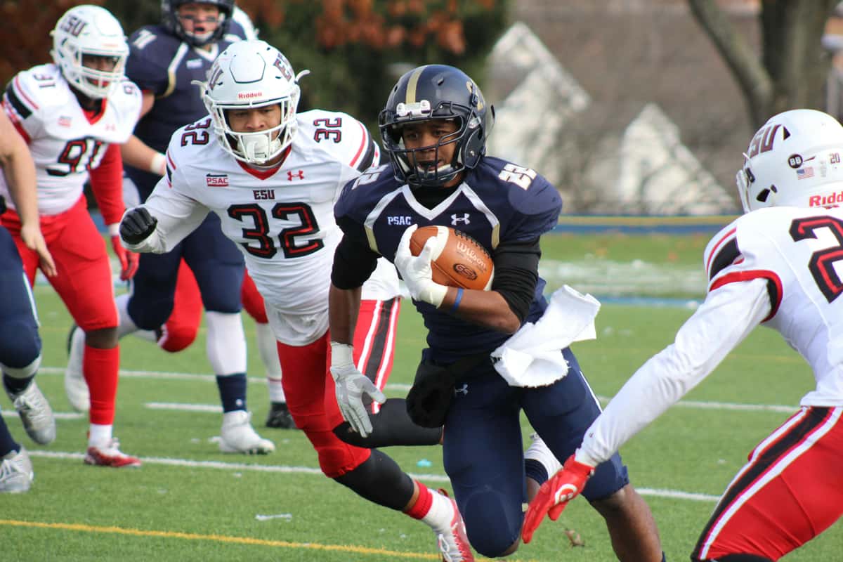 football players playing a scrimmage