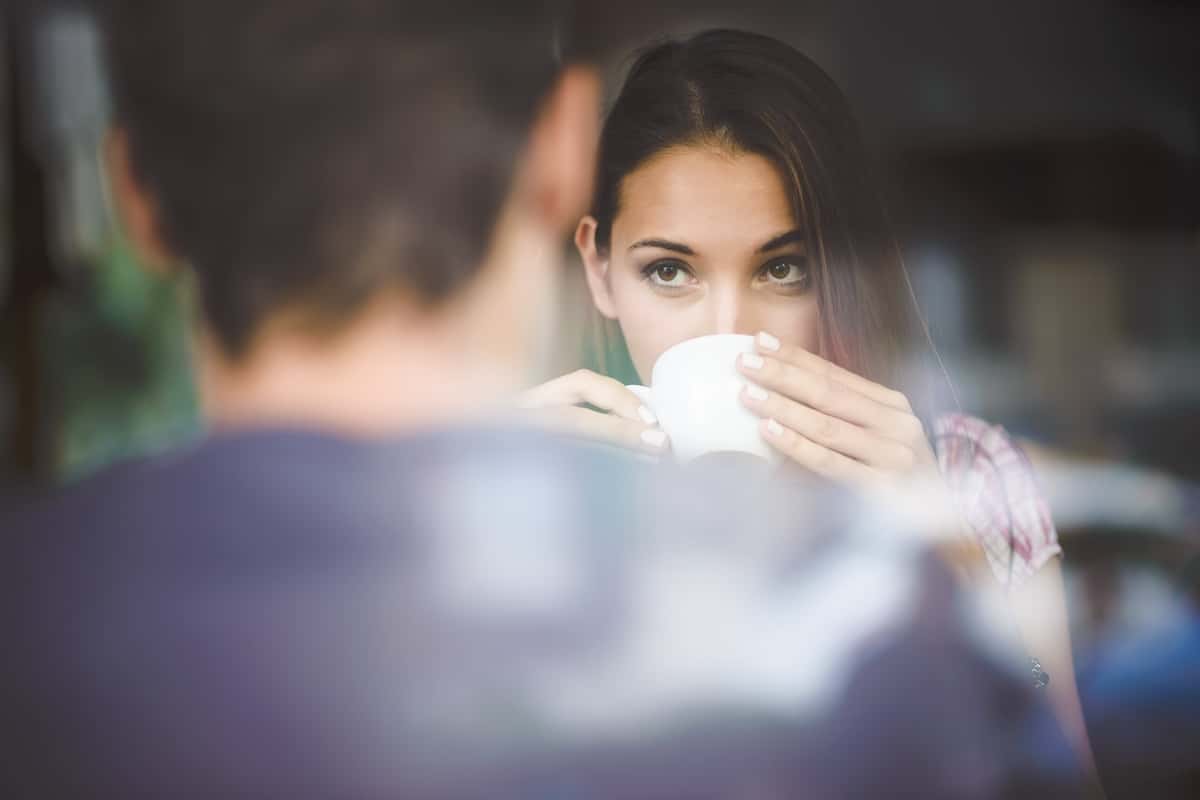 first date, woman sipping coffee