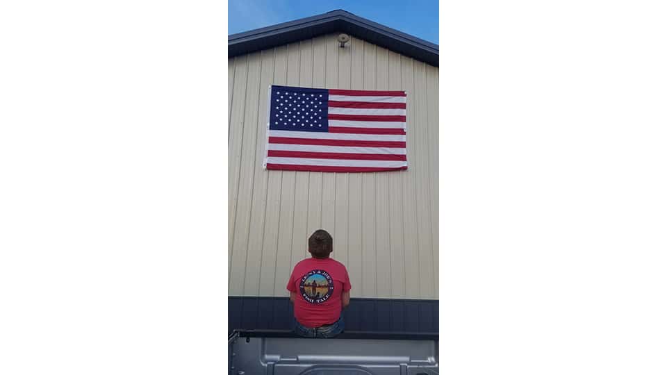 Braxton looking up at Flag