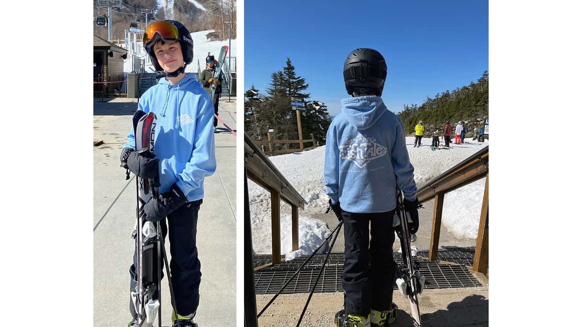 Young teen wearing a Fish Tale Sweatshirt