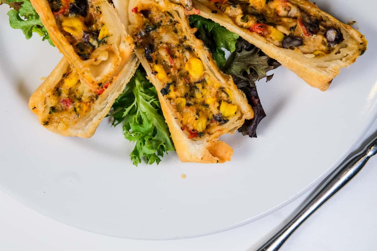 Southwestern Chicken Egg Rolls- served with chicken, onion, black