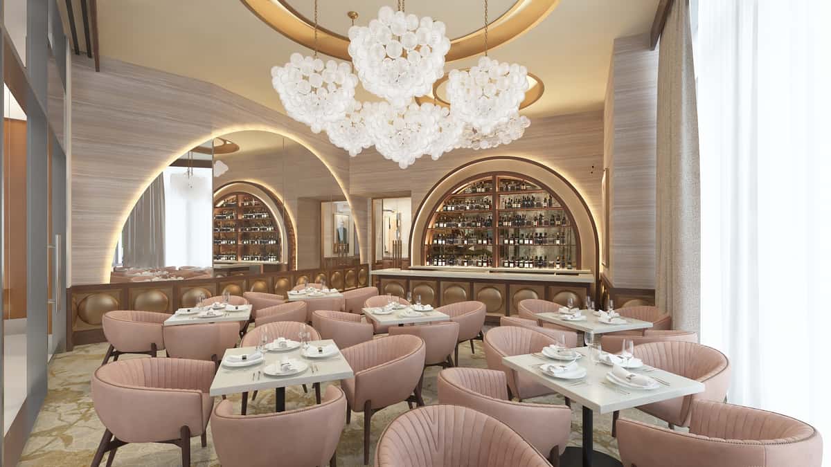 Elegant Champagne Room with plush seating, arched wine displays, statement floral chandelier, and sophisticated fine dining ambiance.