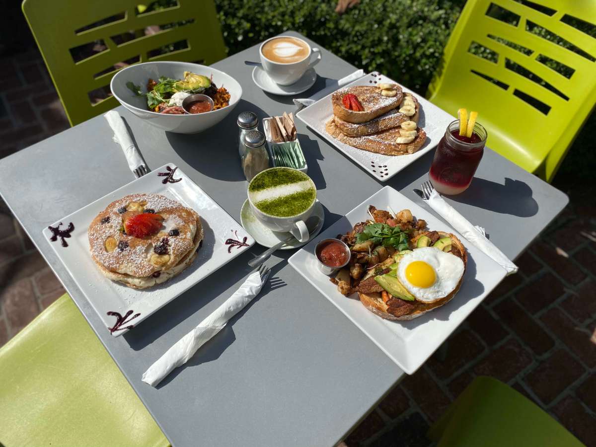 table with plates of food