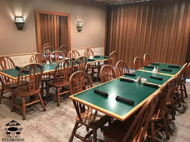 tables and chairs inside restaurant