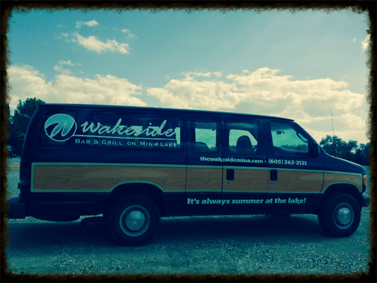 Wakeside Bar and Grill shuttle van with a filtered effect