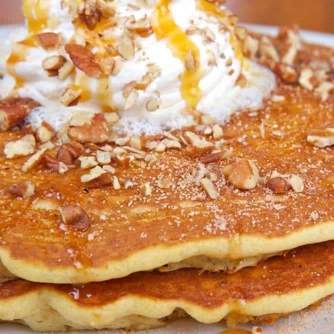 pancakes with pecans and whipped cream