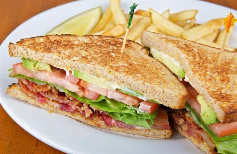 Club sandwich with fries