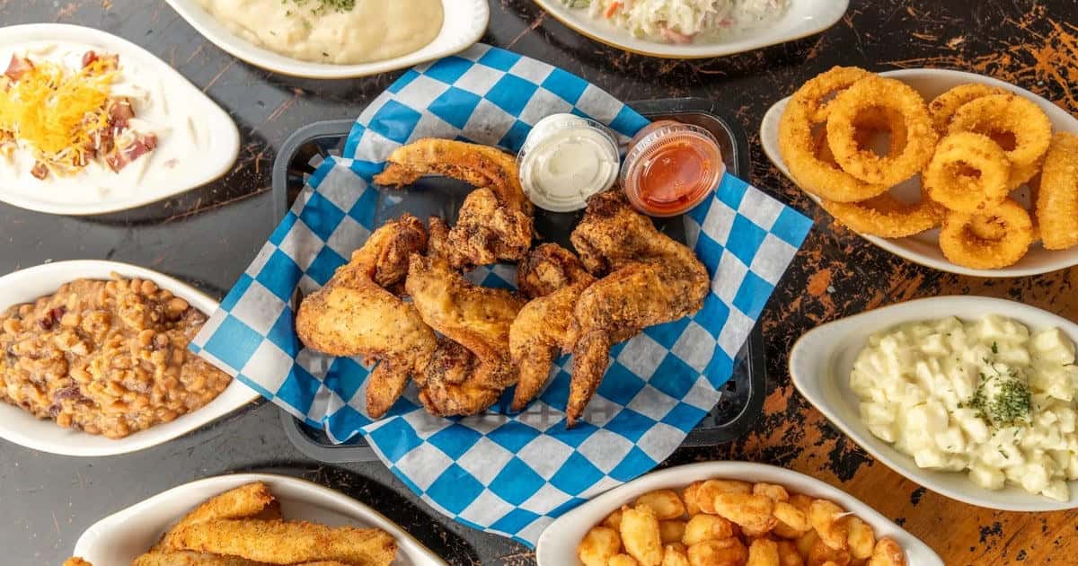 Jumbo chicken wings in a basket with ranch and hot sauce at Mother Clucker’s Pizza in Loring Park, Minneapolis.