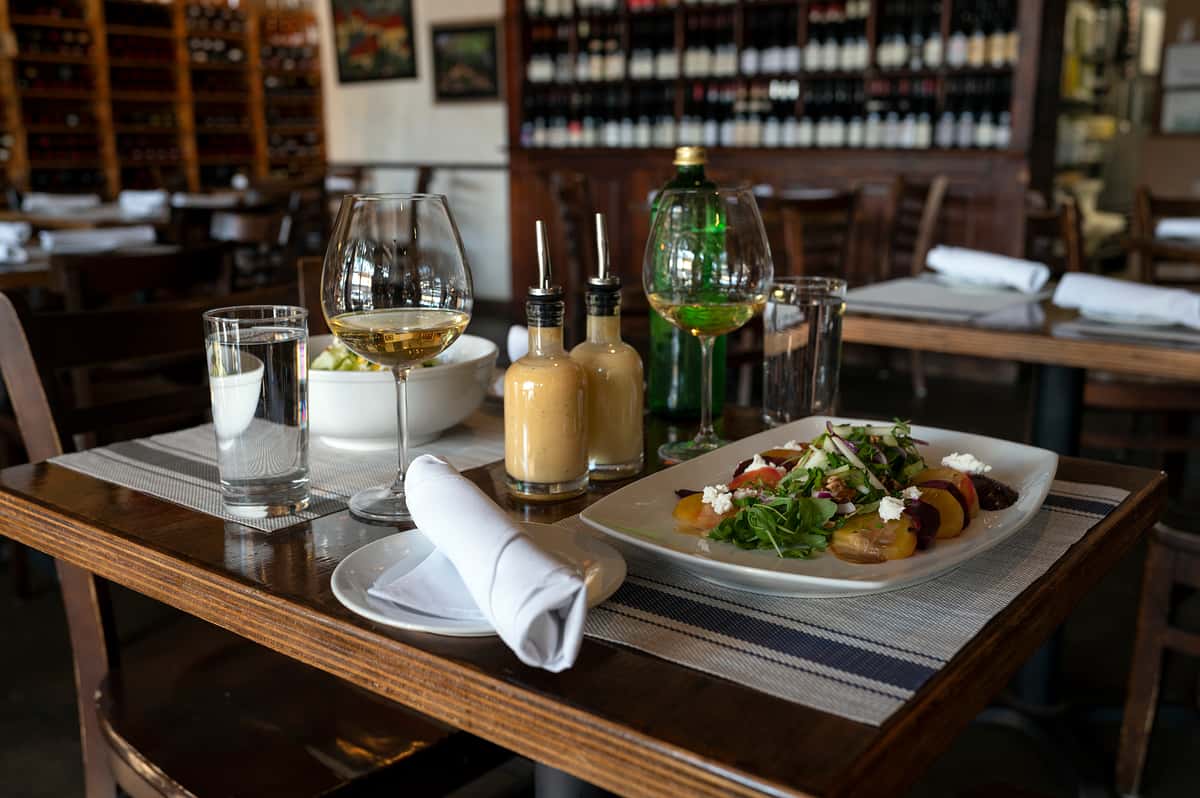 Table setting full of food and drinks