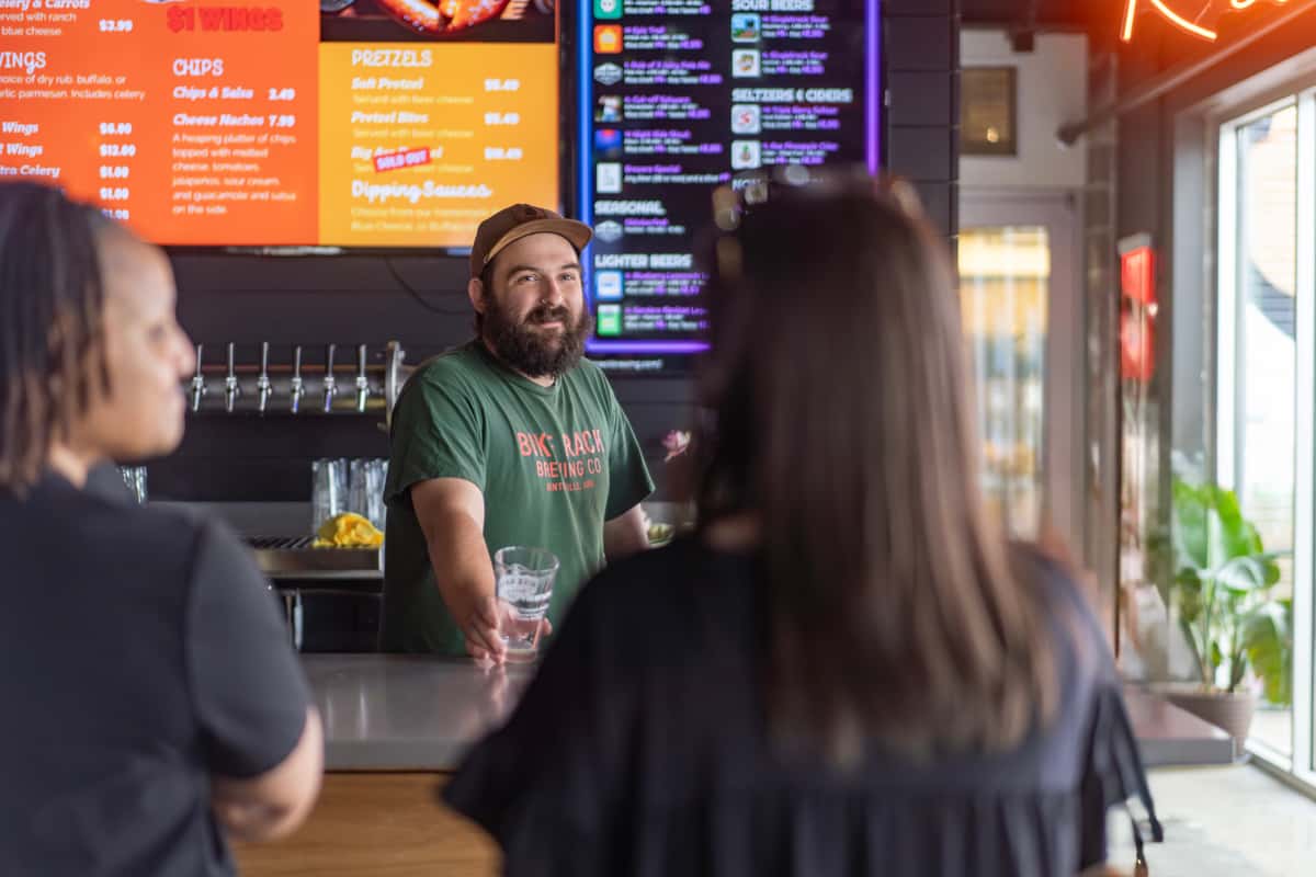Bartender Josh serving patrons