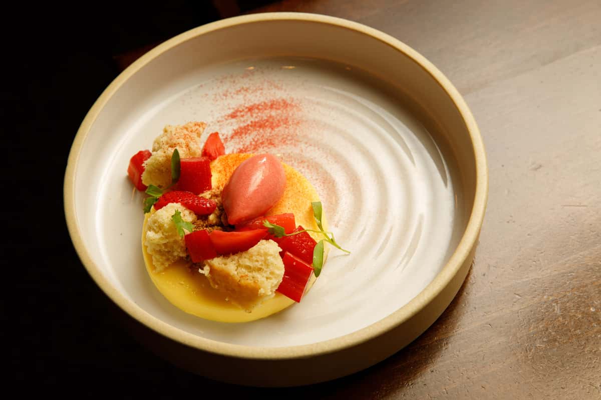 Lemon curd dessert with fresh strawberries