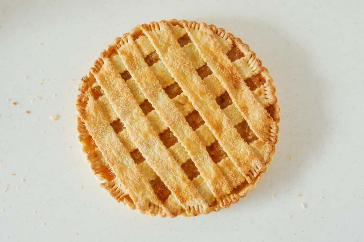 Golden sugar-sprinkled lattice fruit pie from The Sunflower Bakery Café.