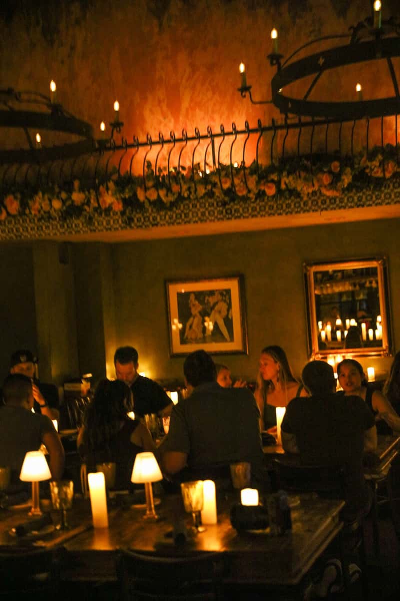 Guests dining by candlelight inside Habana at The LAB