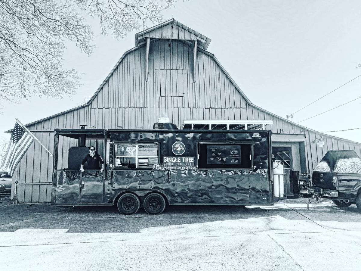 food truck in front of barn