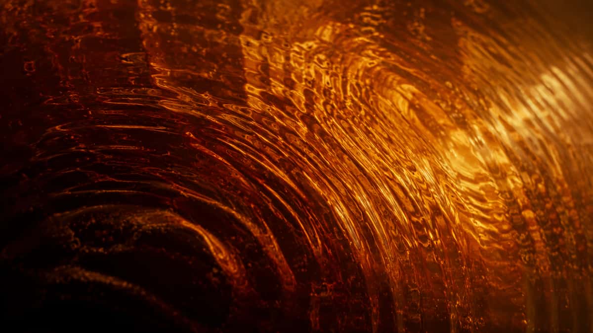 Sound waves traveling through whisky in the Musically Mastered process