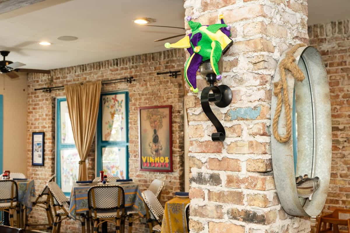 mardi gras decoration on interior brick wall