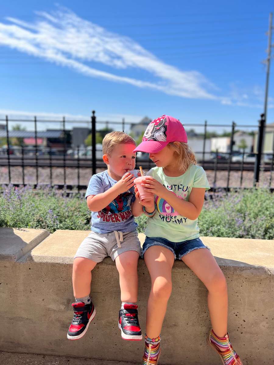 Children drinking a smoothie