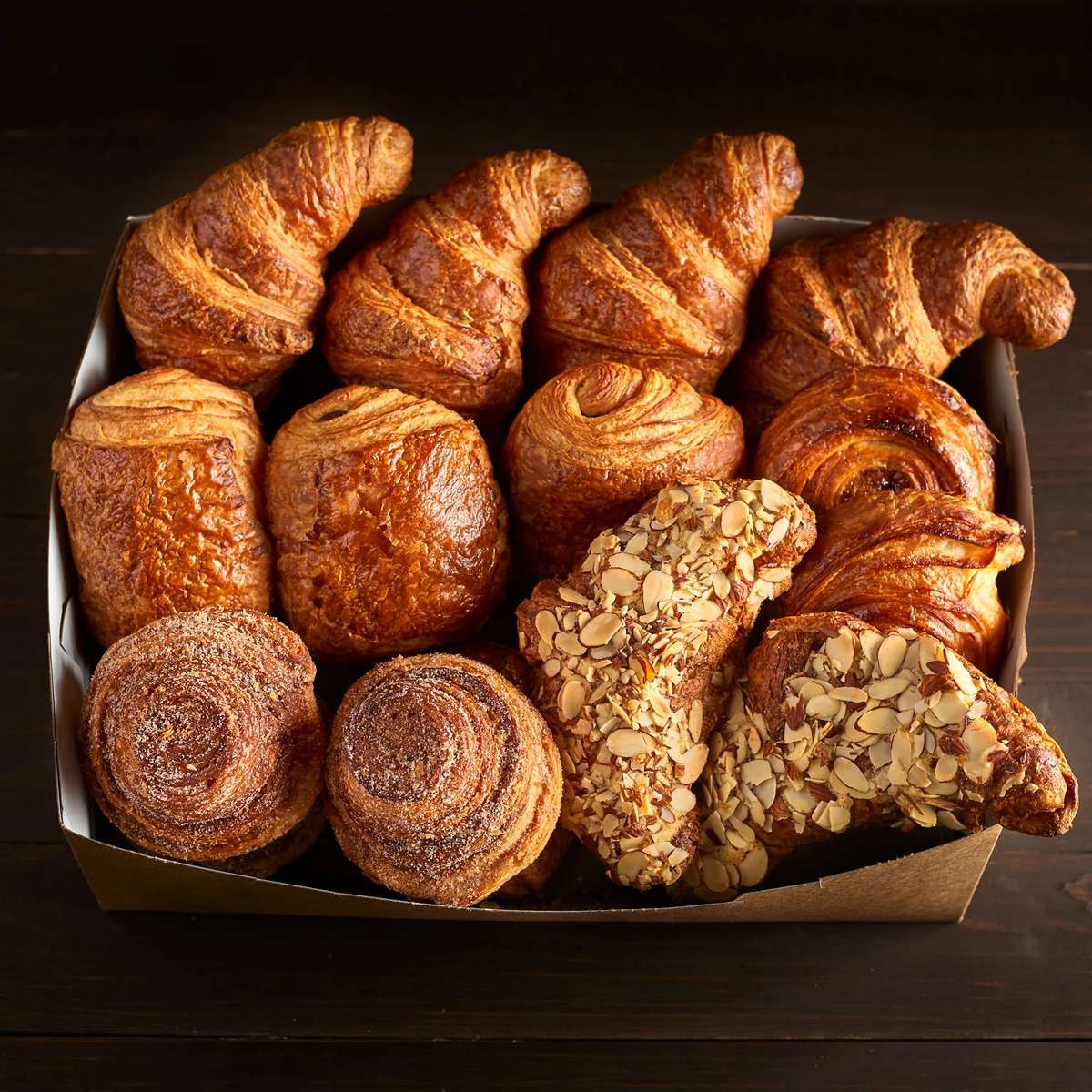 variety of breads, croissants, and pastries