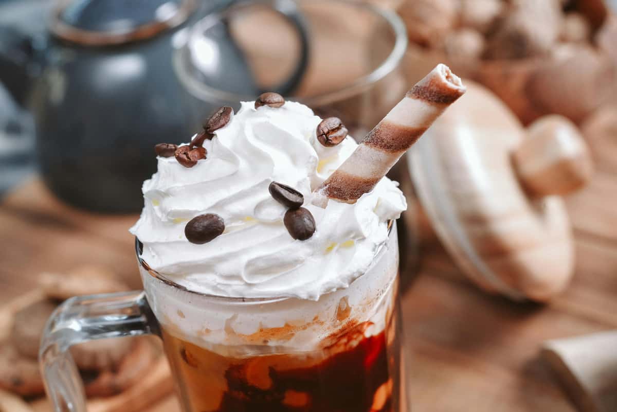 coffee drink with whipped cream and toppings