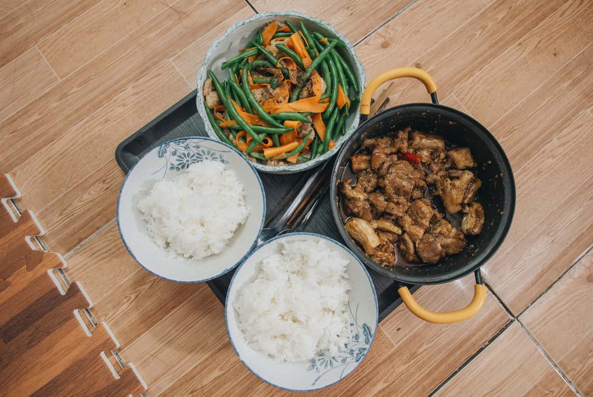 2 dishes with bowls of rice