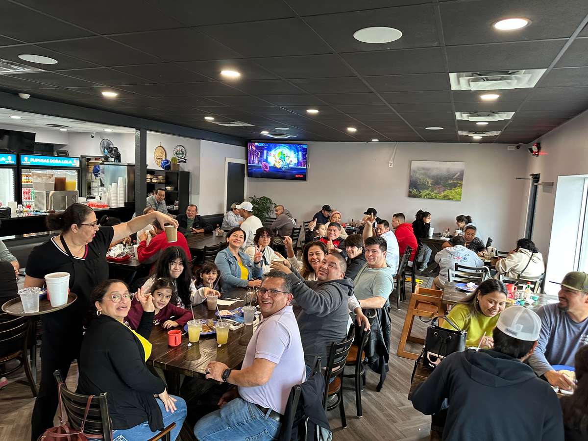 People eating at Pupusas
